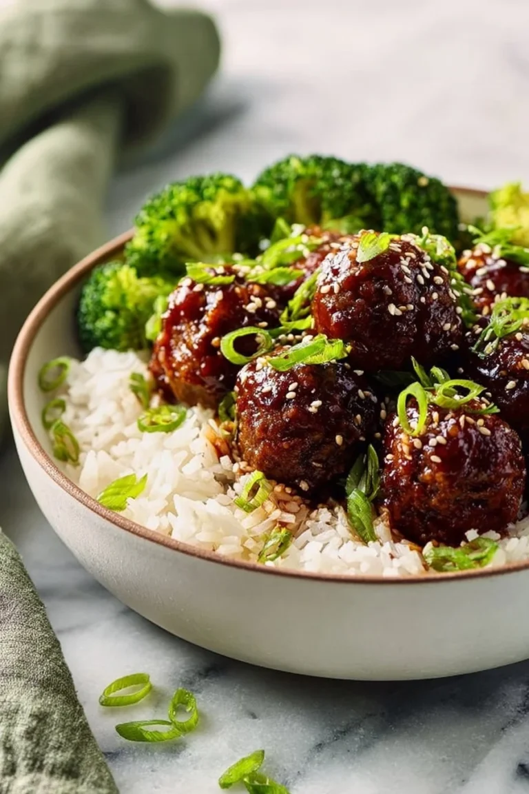 Garlic Mongolian Beef Meatballs served on a plate with garnish