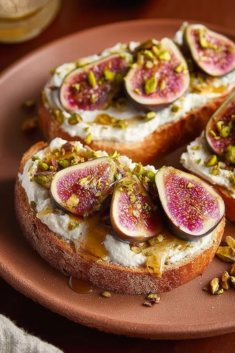 Delicious cottage cheese and fig toast topped with fresh figs and herbs