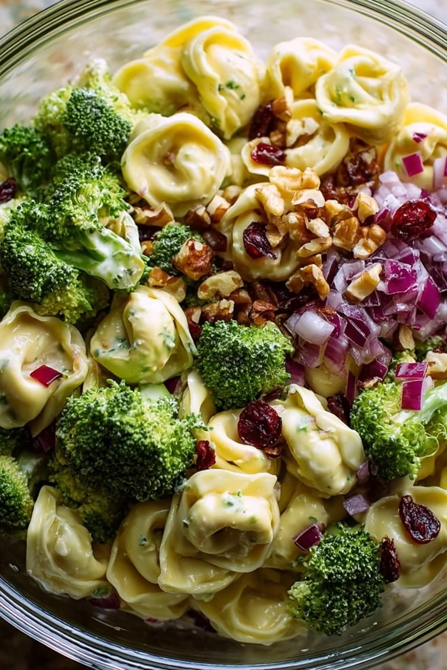 Broccoli Tortellini Pasta Salad served in a bowl with fresh ingredients