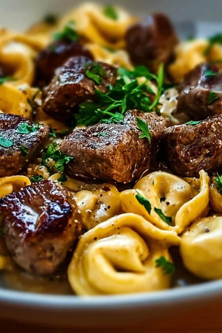Cracked Garlic Steak Tortellini in creamy sauce served in a bowl