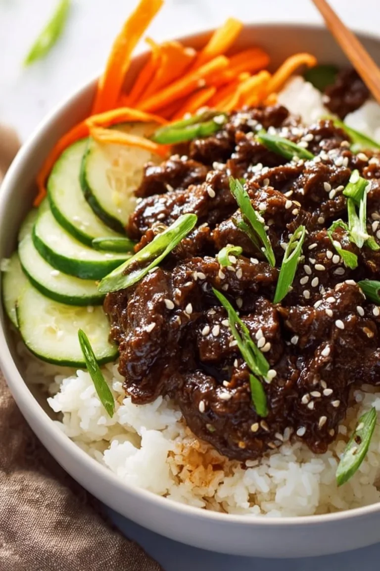 Delicious Korean beef bowls topped with vegetables and sesame seeds