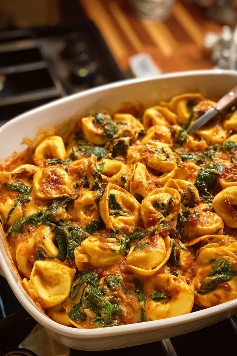 Delicious Marry Me Tortellini served in a bowl with fresh herbs.