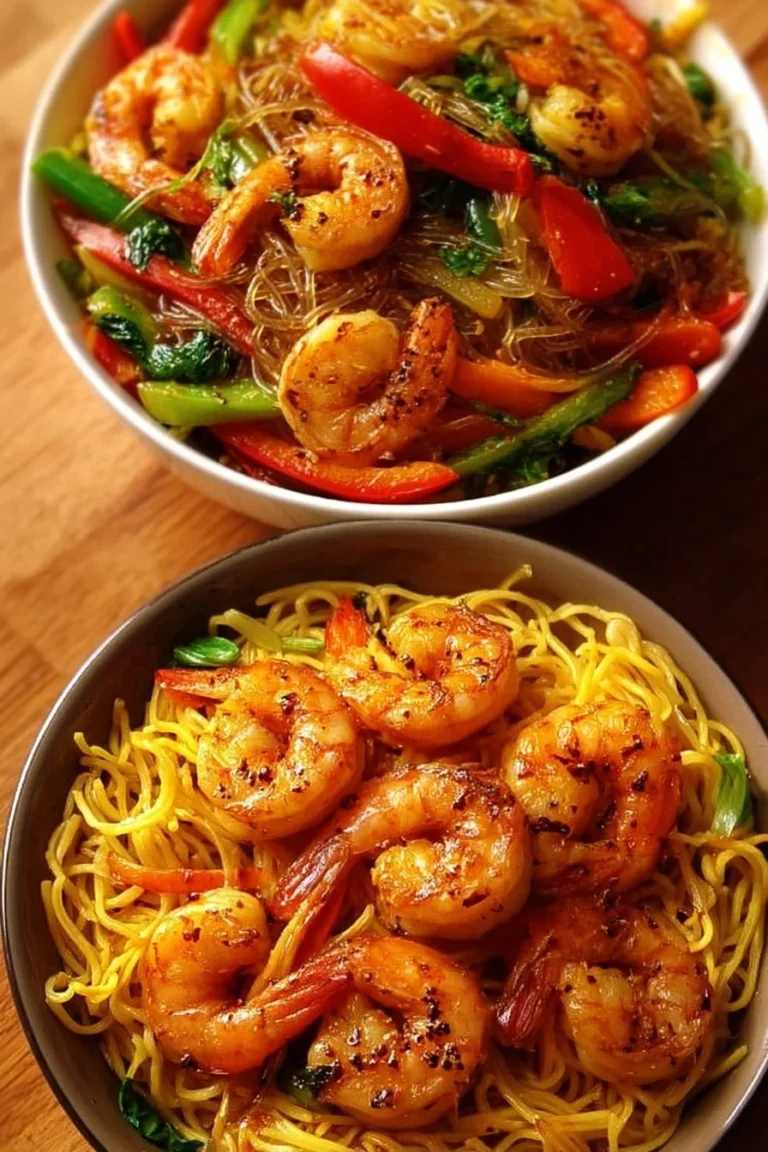 Colorful shrimp noodle stir fry with vegetables served in a bowl.