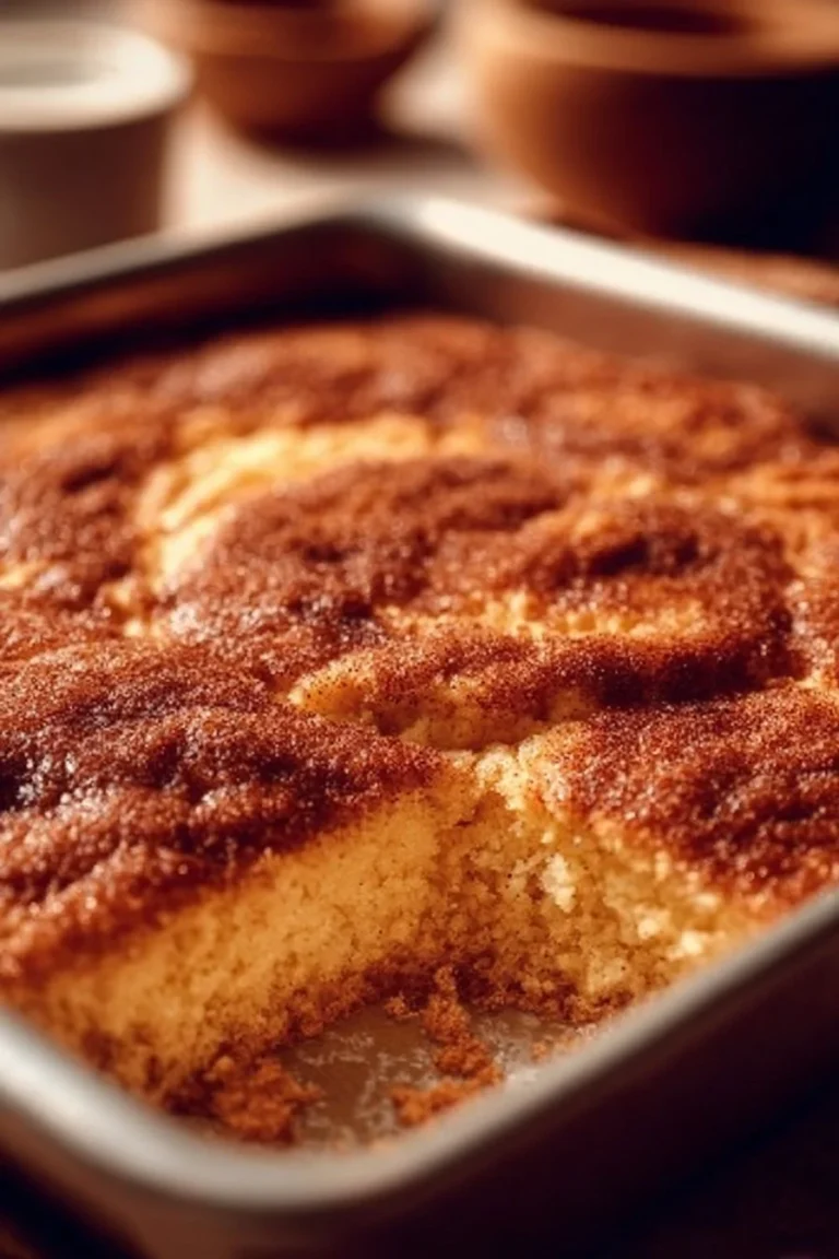 Delicious snickerdoodle cobbler served with a scoop of ice cream